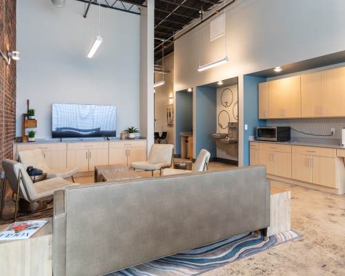 Spacious living room at Mojud Lofts in Greensboro, North Carolina