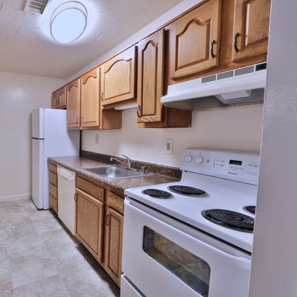 Kitchen with white appliances at Morningside Apartments & Townhomes in Owings Mills, Maryland