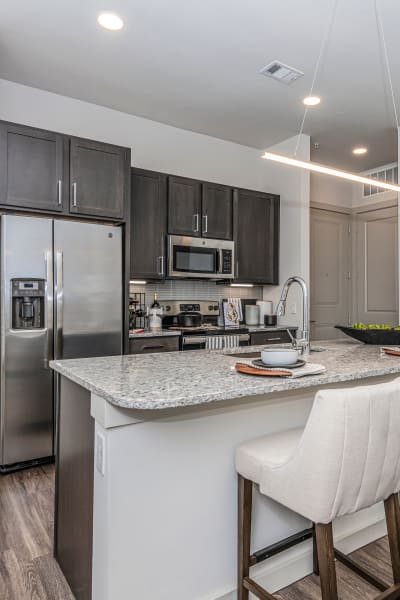 Kitchen island at Magnolia on the Green in Allen, Texas