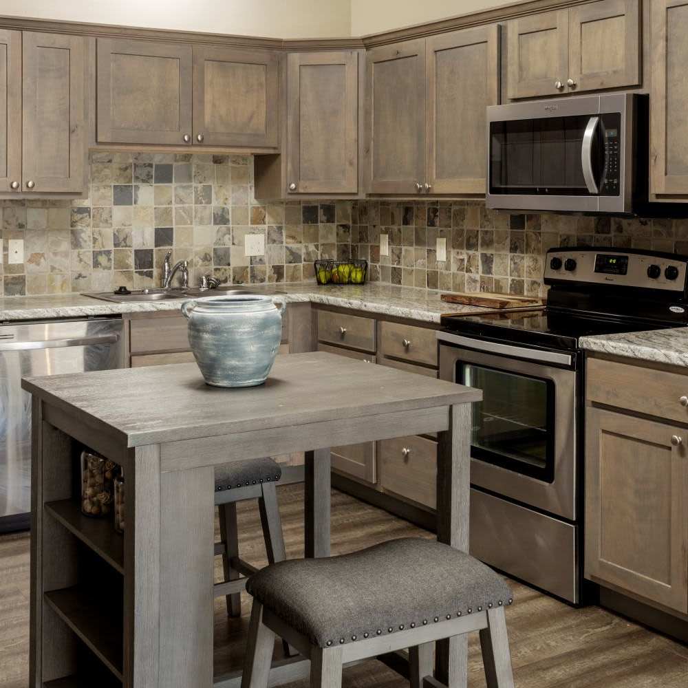 Kitchen with cabinetry at InterUrban Apartments in Billings, Montana