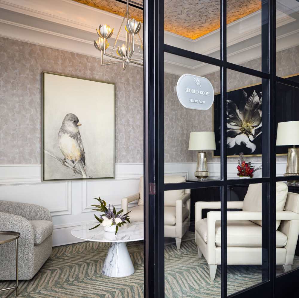 Stylish lounge area with modern furniture at Novel Turtle Creek in Dallas, Texas