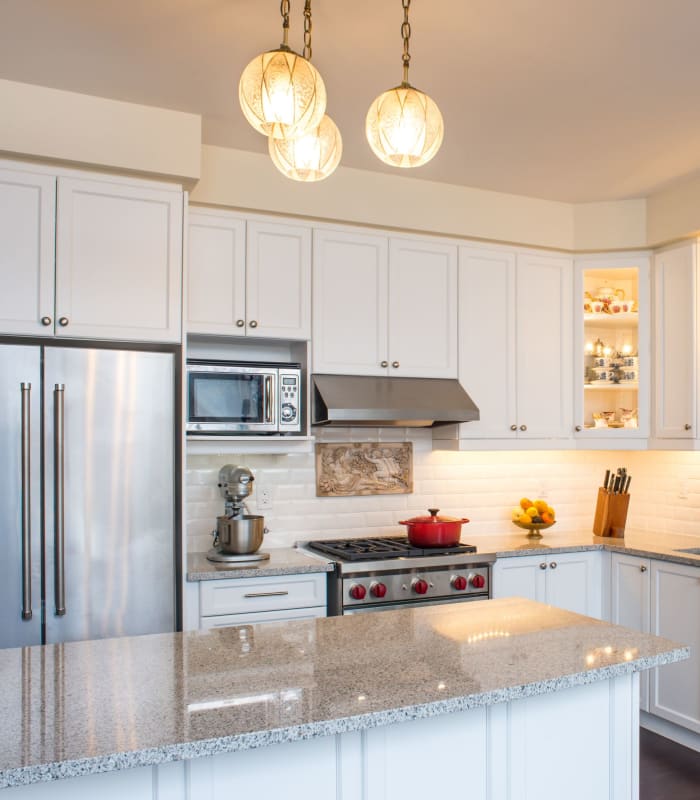Model kitchen with white accents at Chisholm Pointe in Oklahoma City, Oklahoma