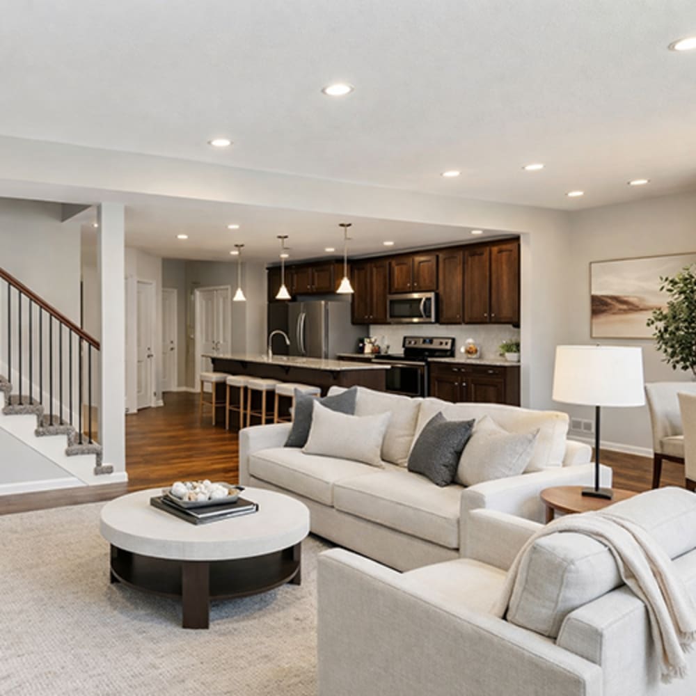 Spacious living room with view to kitchen at Chapel Ridge in Lees Summit, Missouri