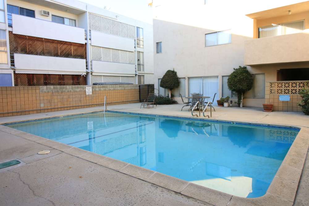 Swimming pool with lounge chairs at Regency in Sherman Oaks,California