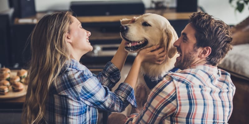 Family with dog at Maple Bay Townhomes in Virginia Beach, Virginia