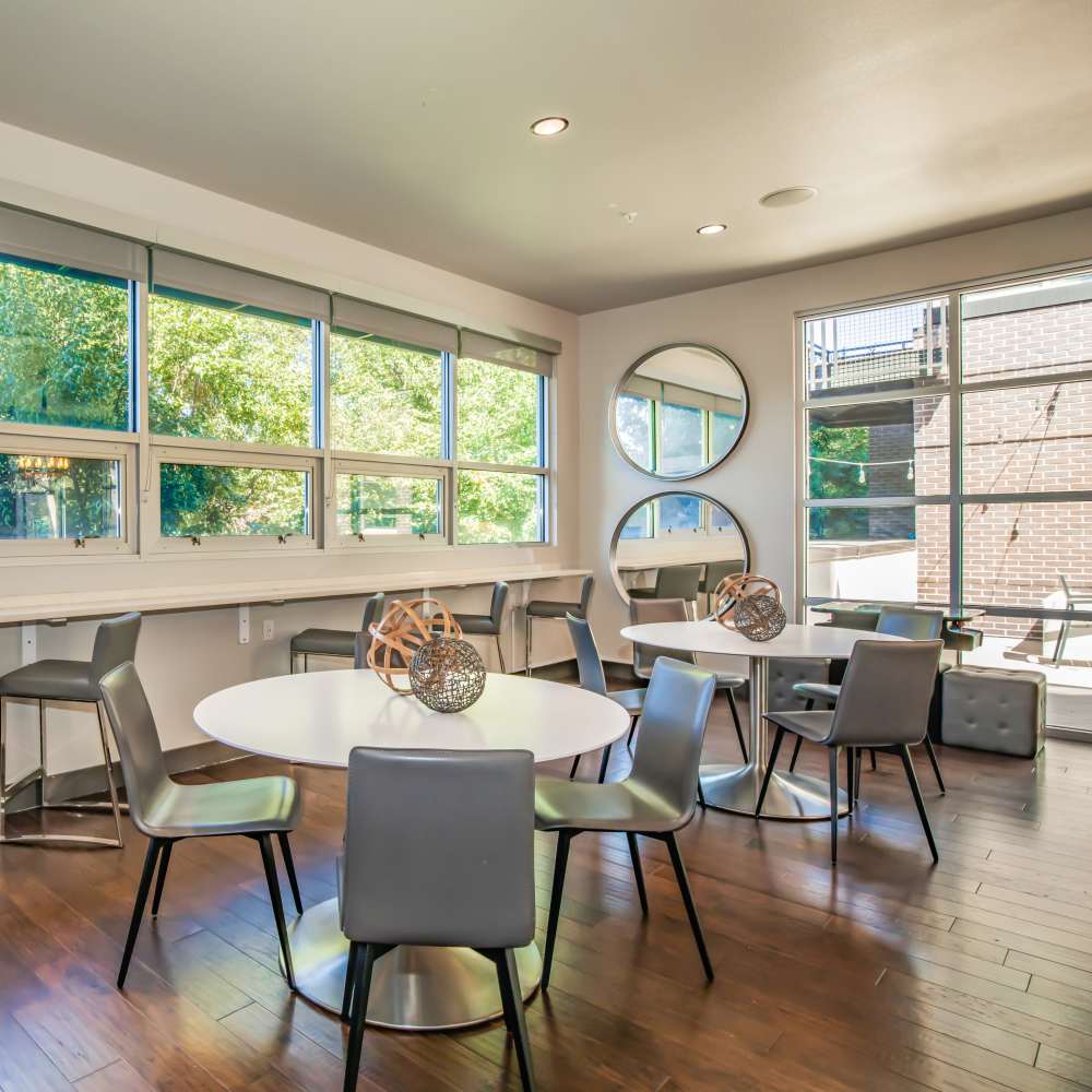 Community seating area with hard-wood flooring at Park Place Olde Town Apartments in Arvada, Colorado