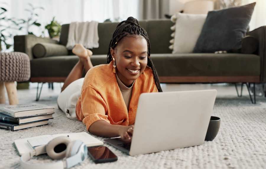 Resident using her laptop at Reserve at Northshore in Lynn Haven, Florida