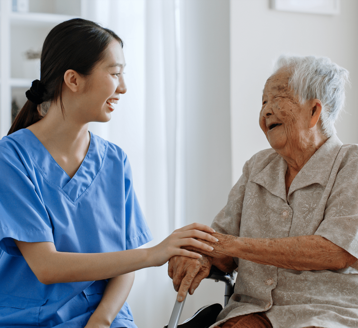 Nurse helping a resident at Harmony at Savannah in Savannah, Georgia