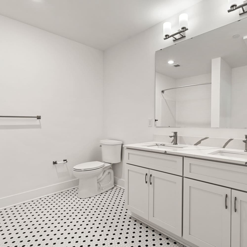 Bathroom with white cabinetry at Culver Street in Newington, Connecticut