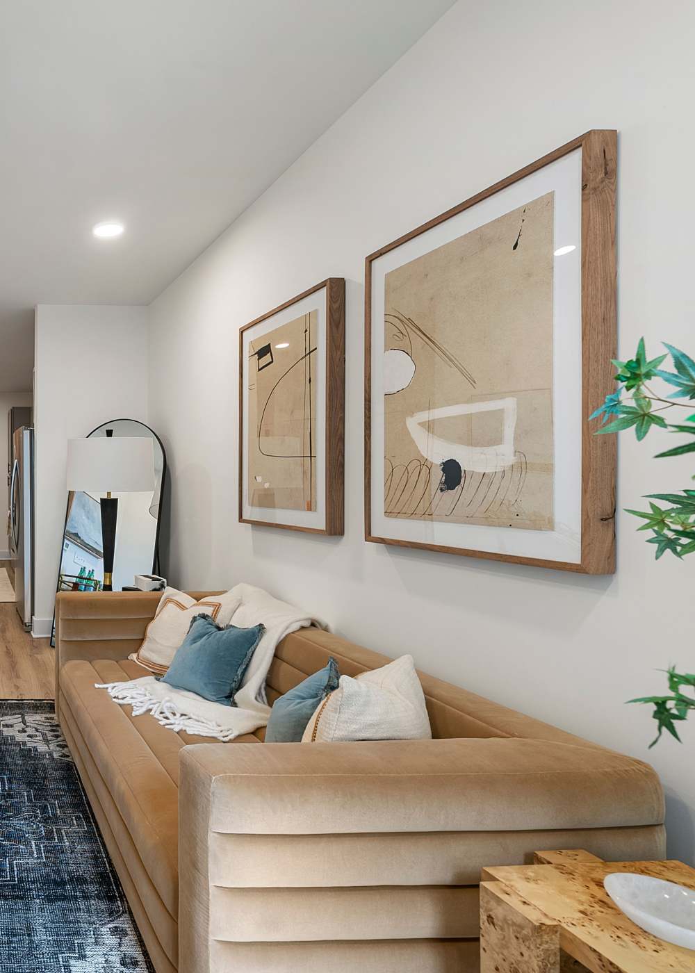 Living room with sofa at The Acorn on Person Street in Raleigh, North Carolina