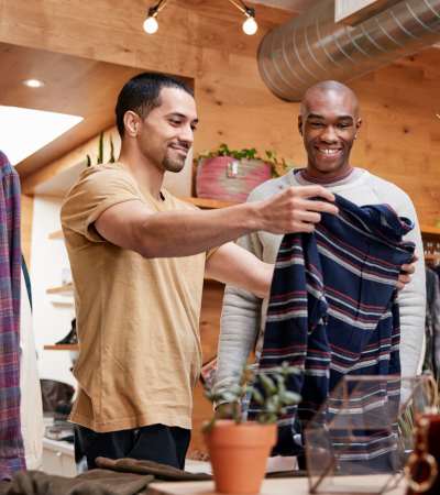 Residents shopping at a local store near Studio Park Lofts & Tower in Grand Rapids, Michigan