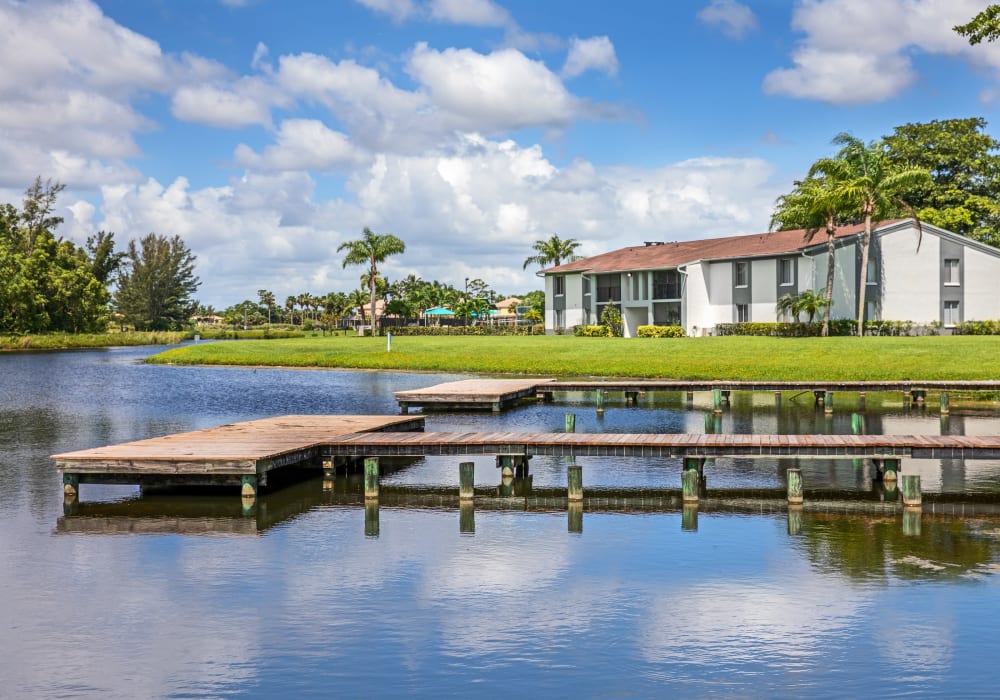 Palm trees and dock near Verse at Royal Palm Beach in Royal Palm Beach, Florida