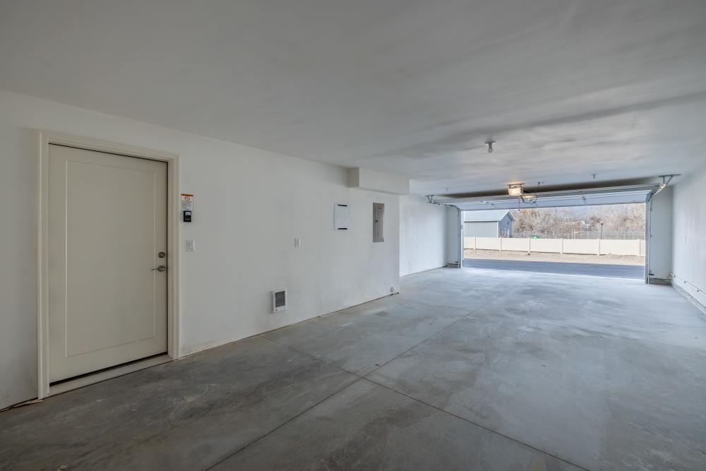 Garage with direct access to apartment entrance at 14th Street Townhomes in East Wenatchee, Washington