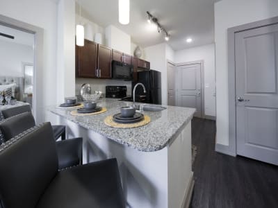 Gourmet kitchen with granite countertops at Steelyard in Oklahoma City, Oklahoma