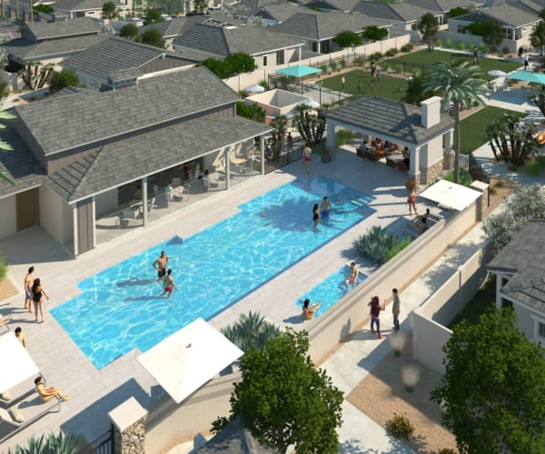 Woman relaxing in pool at Sobremesa Villas in Surprise, Arizona