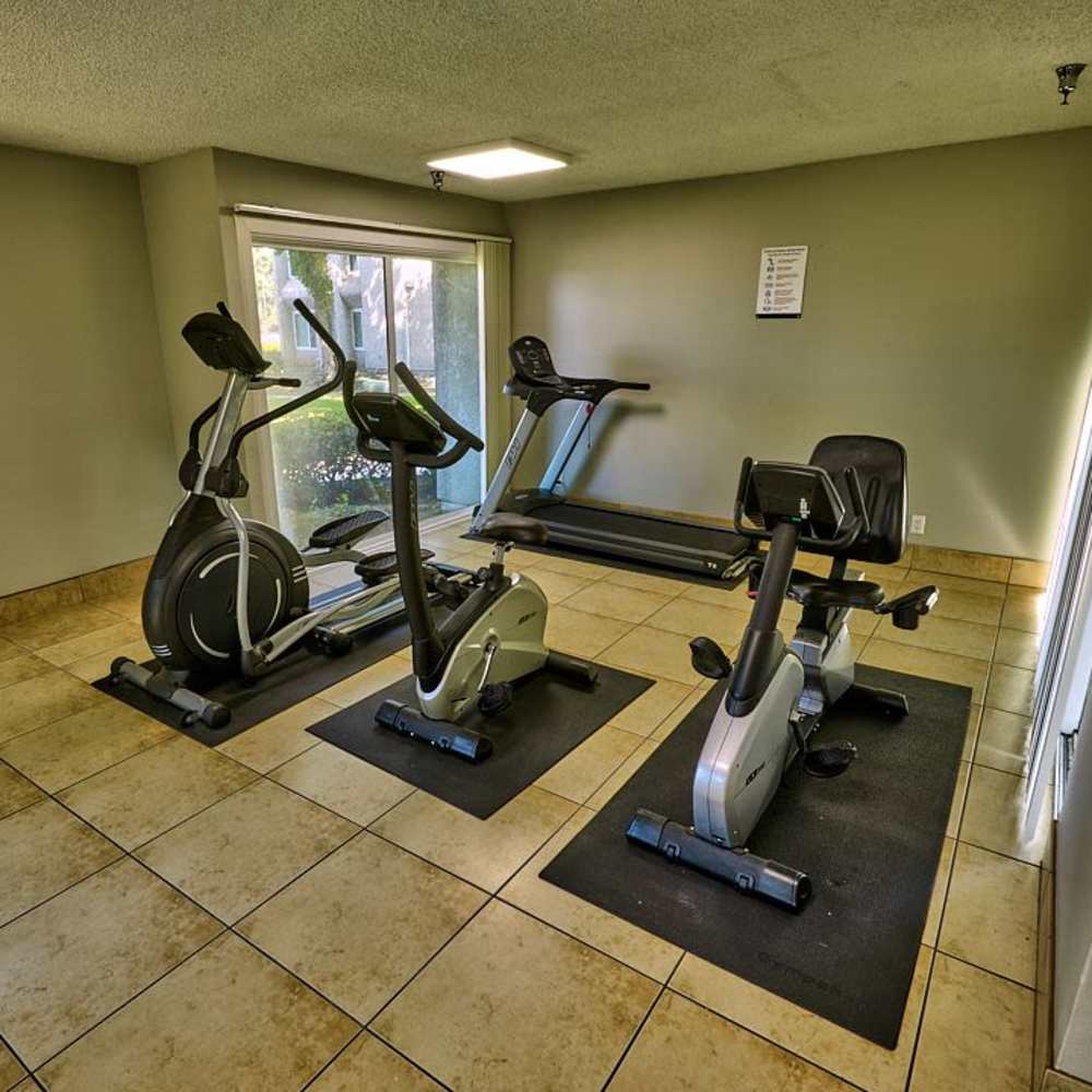 Well-equipped fitness center at Tustin Gardens in Tustin, California