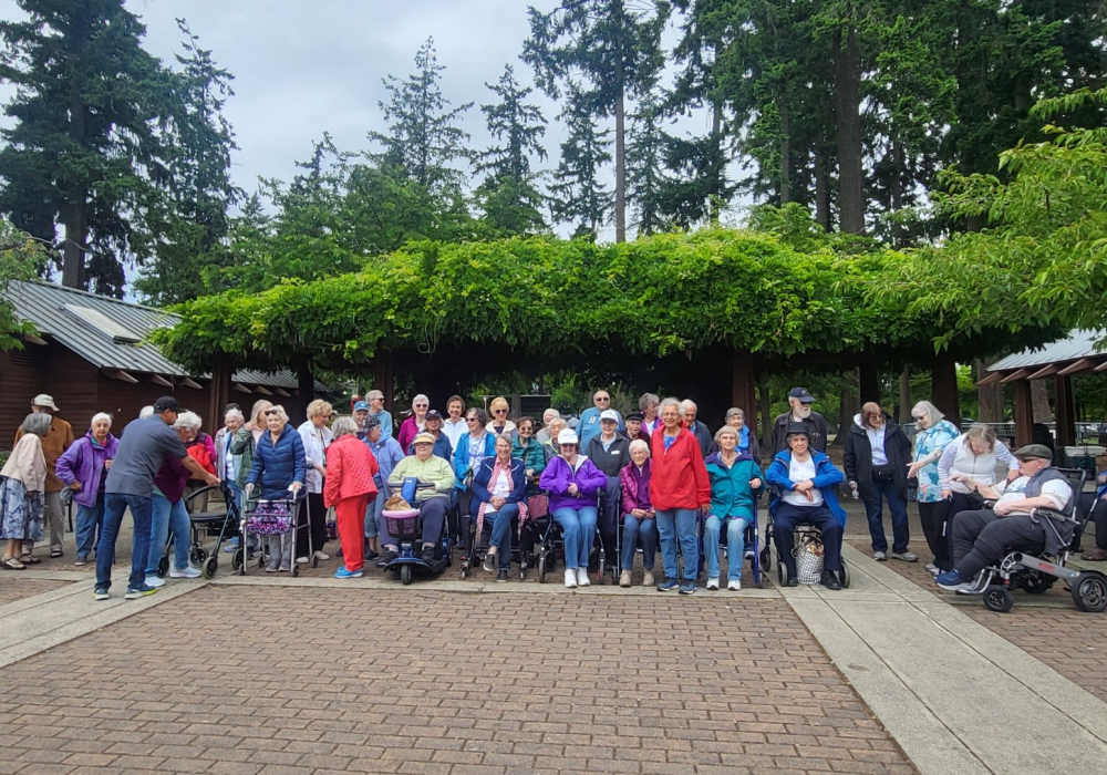 Group photo of the residents at Merrill Gardens at The University in Seattle, Washington