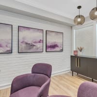 Office area with purple chairs at The Maxwell in Metairie, Louisiana