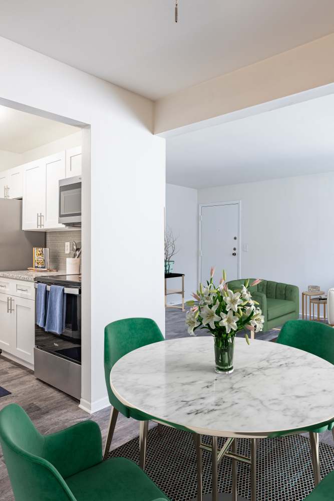 Staged dining area with vinyl plank flooring