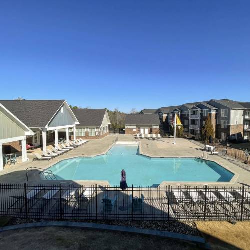 Swimming pool with sun deck at Groves at Berry Creek in Duncan, South Carolina