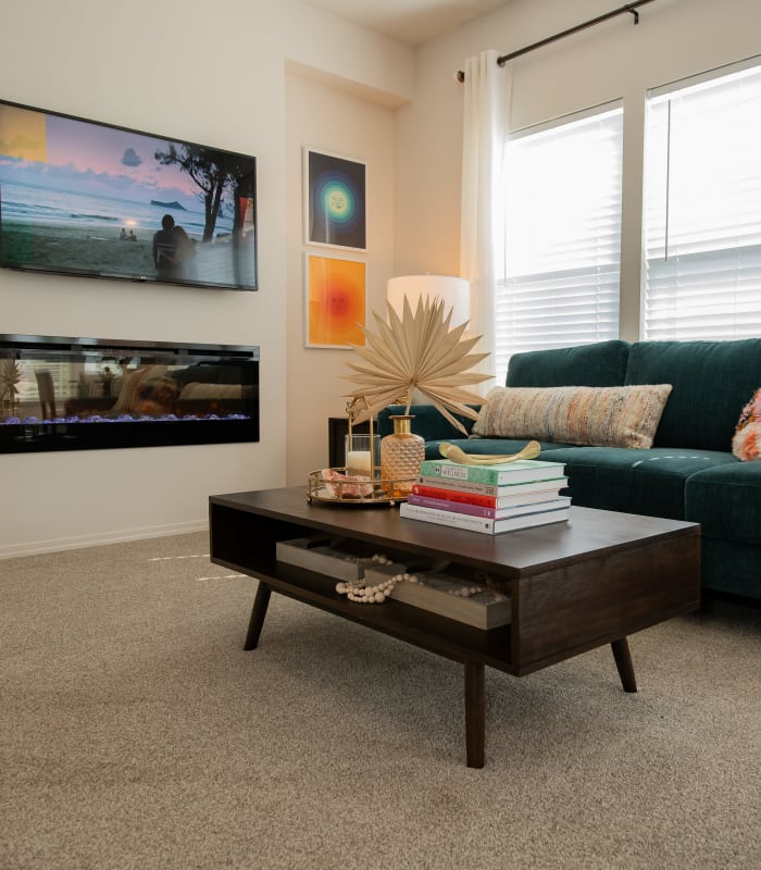 Carpeted living room at Artisan Crossing in Norman, Oklahoma