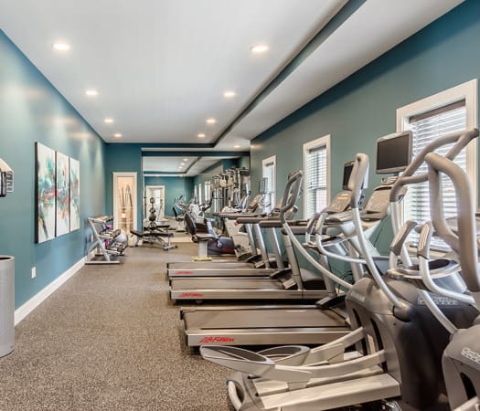 Fully equipped fitness center at Ellison Heights Apartments in Rochester, New York