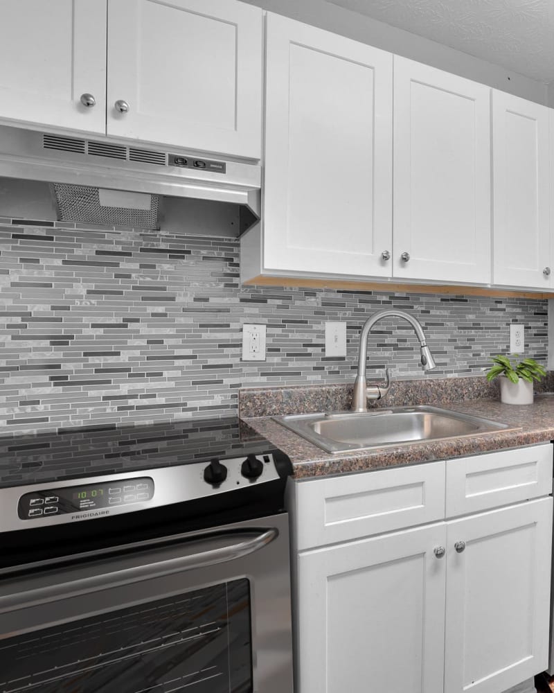 An upgraded apartment kitchen at Residence at Riverside in Austell, Georgia