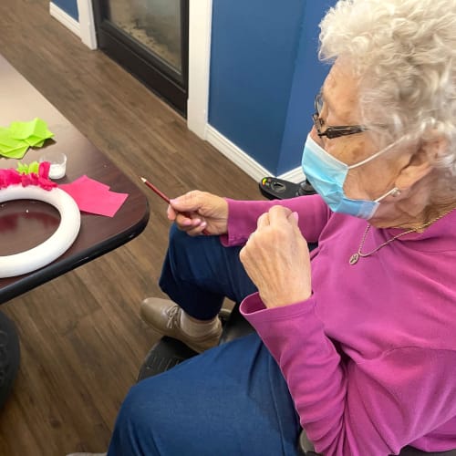 Resident crafting at senior living facility at Madison House in Norfolk, Nebraska