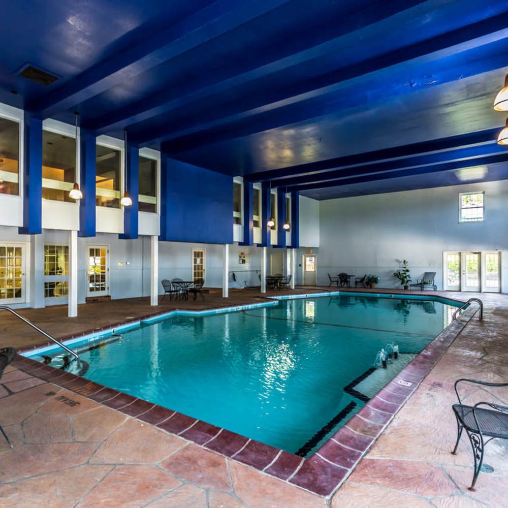 Indoor olympic-sized heated pool at Village Green Apartments in Chesterfield, Missouri