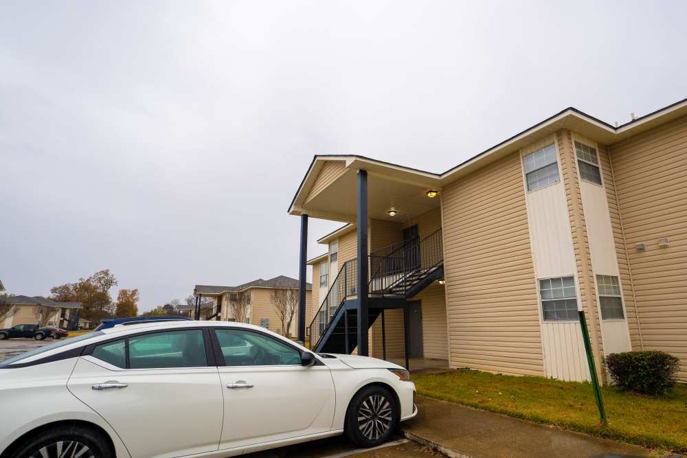 Exterior view of the community parking area at Liberty Village in Monroe, Louisiana