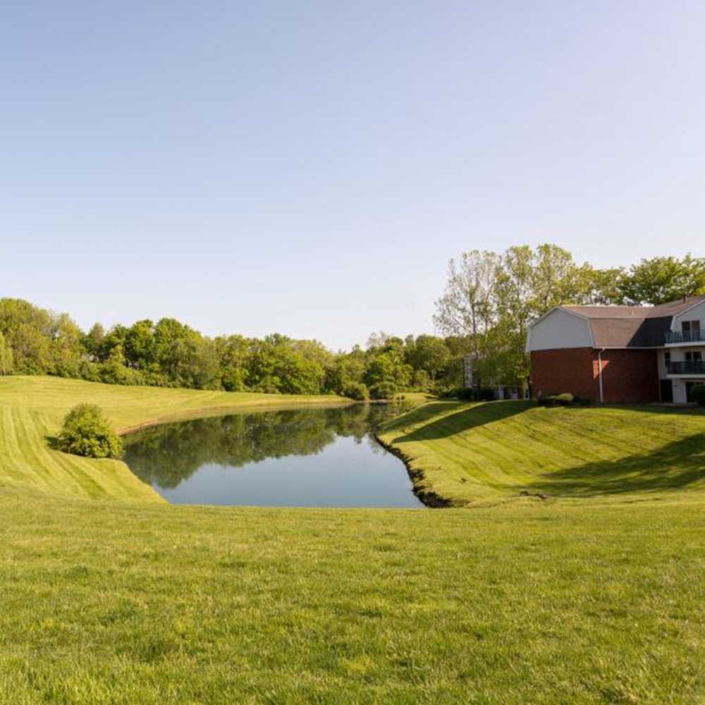 Picturesque lake at Village Green Apartments in Chesterfield, Missouri