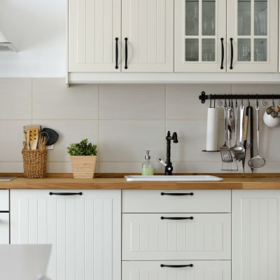 White cabinets in a kitchen at El Centro New Fund Housing (Officers) in El Centro, California