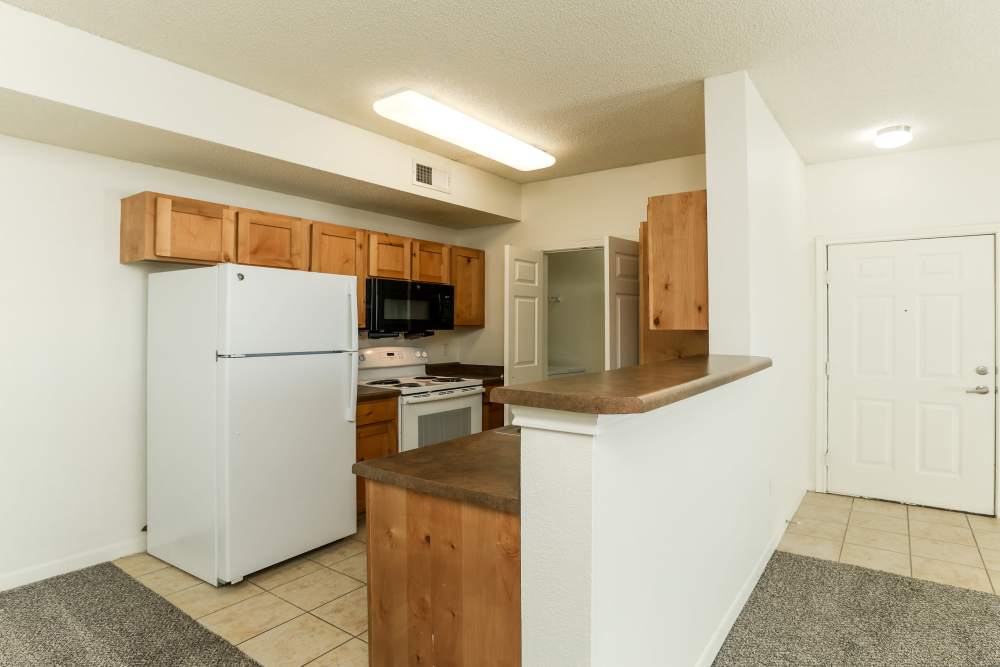 Kitchen with refrigerator at Broadstone II in Bel Aire. KS