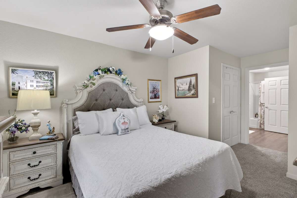 Cozy bedroom at Hill Court Villas in Granbury, Texas