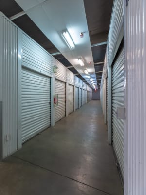An aisle of storage units inside Nova Storage in South Gate, California