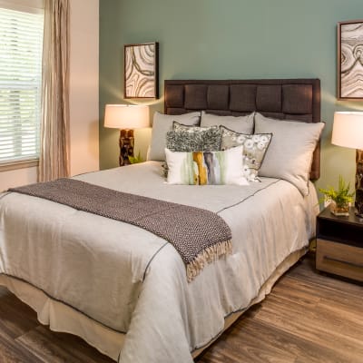 Model bedroom with wood flooring at 17 Barkley in Gaithersburg, Maryland