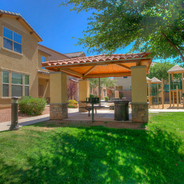 Covered park benches with access to onsite grills at BB Living at Higley Park in Gilbert, Arizona