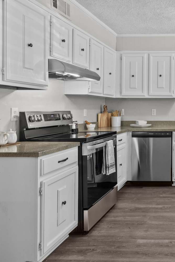 Modern kitchen with white cabinets at Pecan Ridge in Vicksburg, Mississippi 