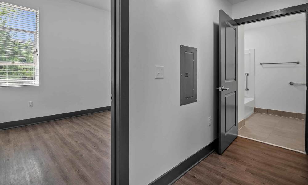 Living area with connecting rooms at The Lofts at the Municipal in Lafayette, Louisiana