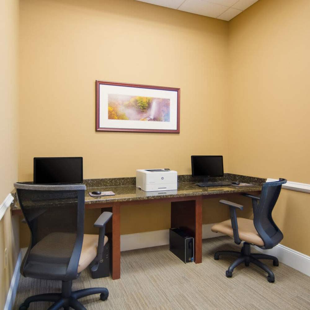 Business center with two workstations at Waverly Place in Louisa, Virginia