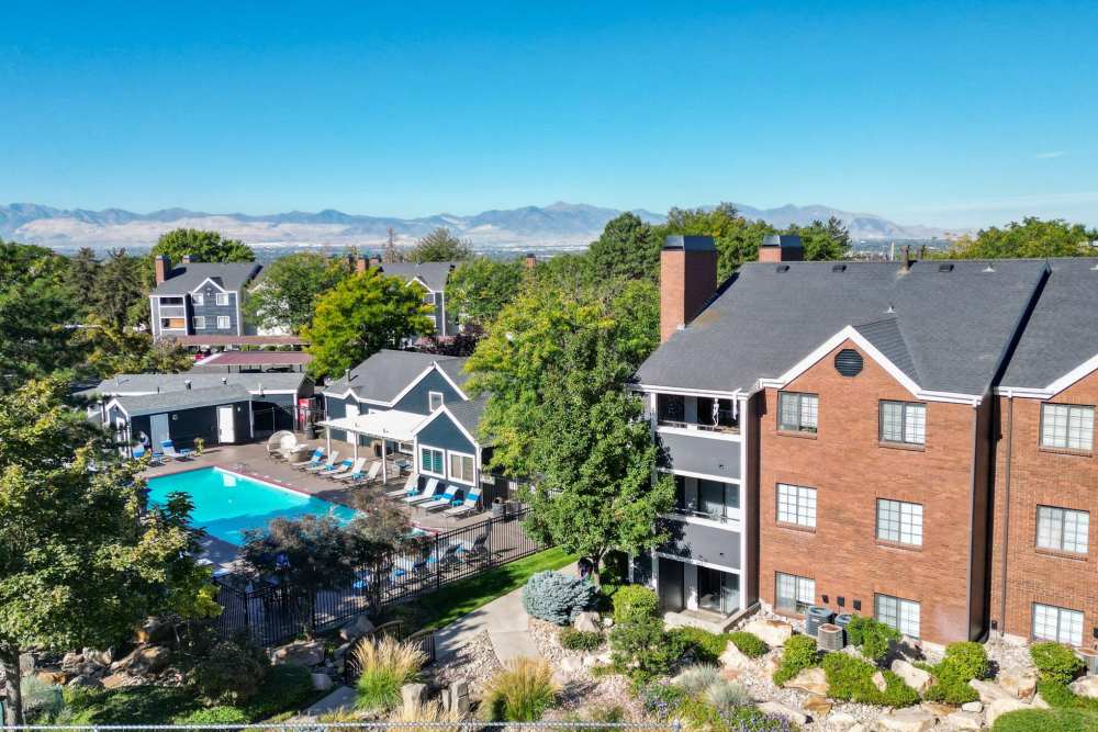 Pool and building exterior at Royal Ridge Apartments in Midvale, Utah