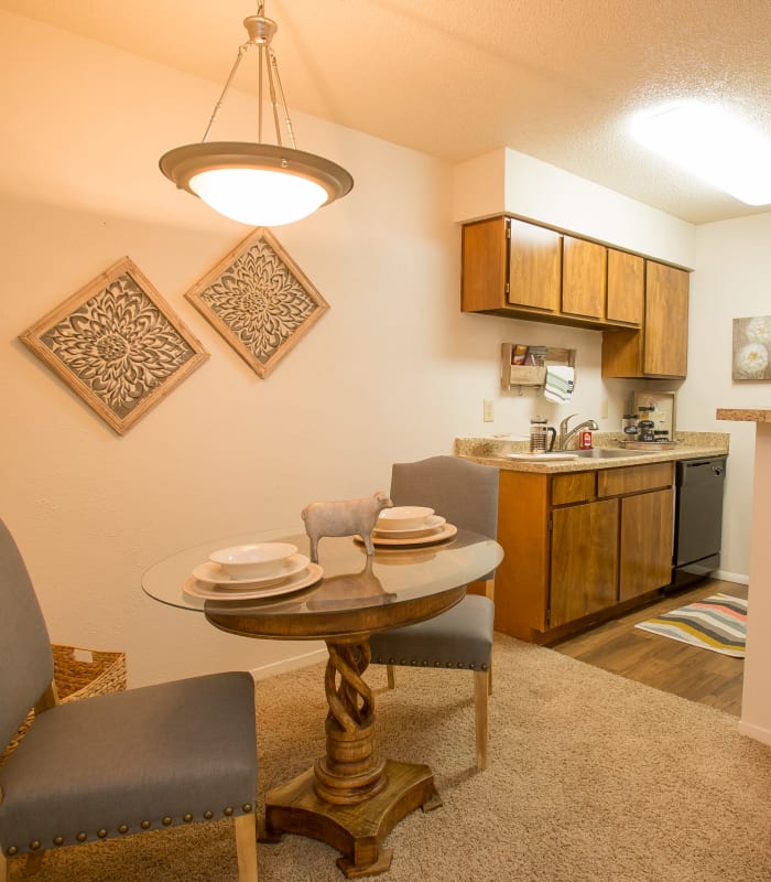 Dining room and kitchen at Cimarron Pointe Apartments in Oklahoma City, Oklahoma