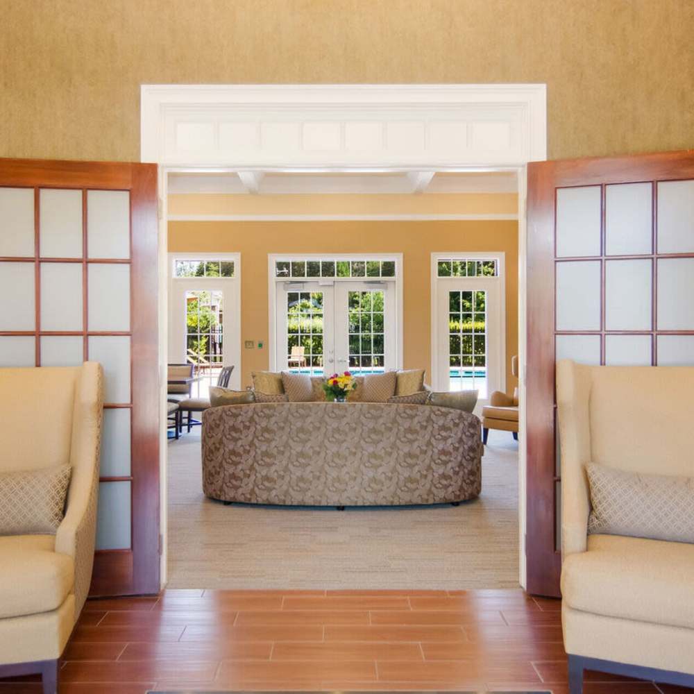 Clubhouse seating area with pool view at Waverly Place in Louisa, Virginia