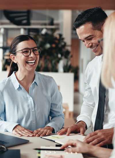 Trio of people talking dressed in business attire Robbins Property Associates, LLC in Tampa, Florida