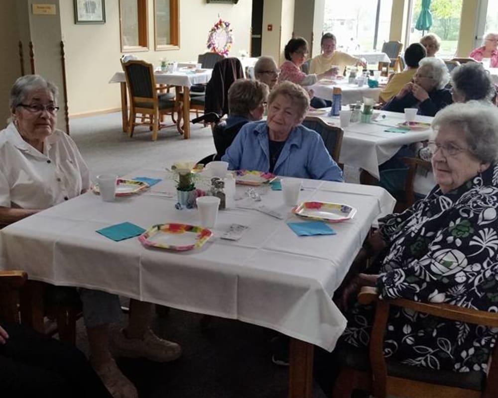 Residents gather in dining room at Prairie Meadows Senior Living in Kasson, Minnesota.