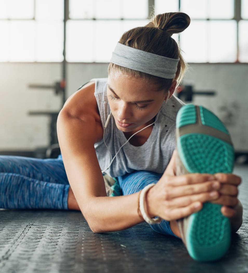 Resident stretching in the fitness center after a workout at Vue Fremont in Fremont, California