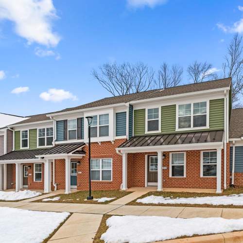Two-story exterior view of building at Brock Bridge Landing in Jessup, Maryland