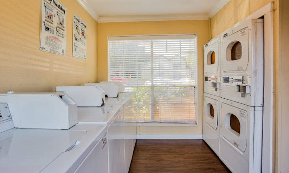 Laundry facility at McCart Apartment Homes in Fort Worth,Texas