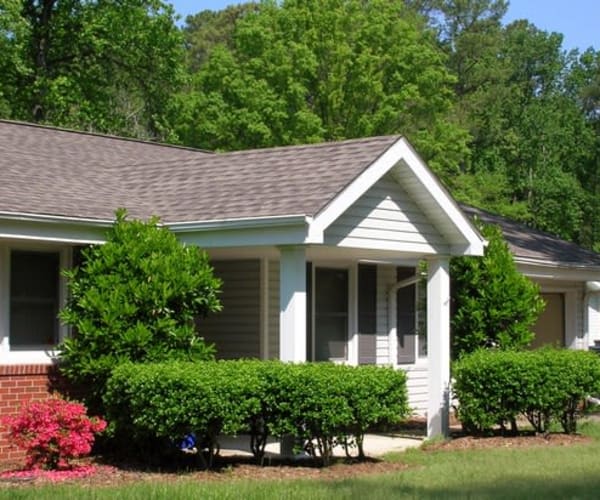 Exterior of home with landscaping at Kiskiak Village in Newport News, Virginia