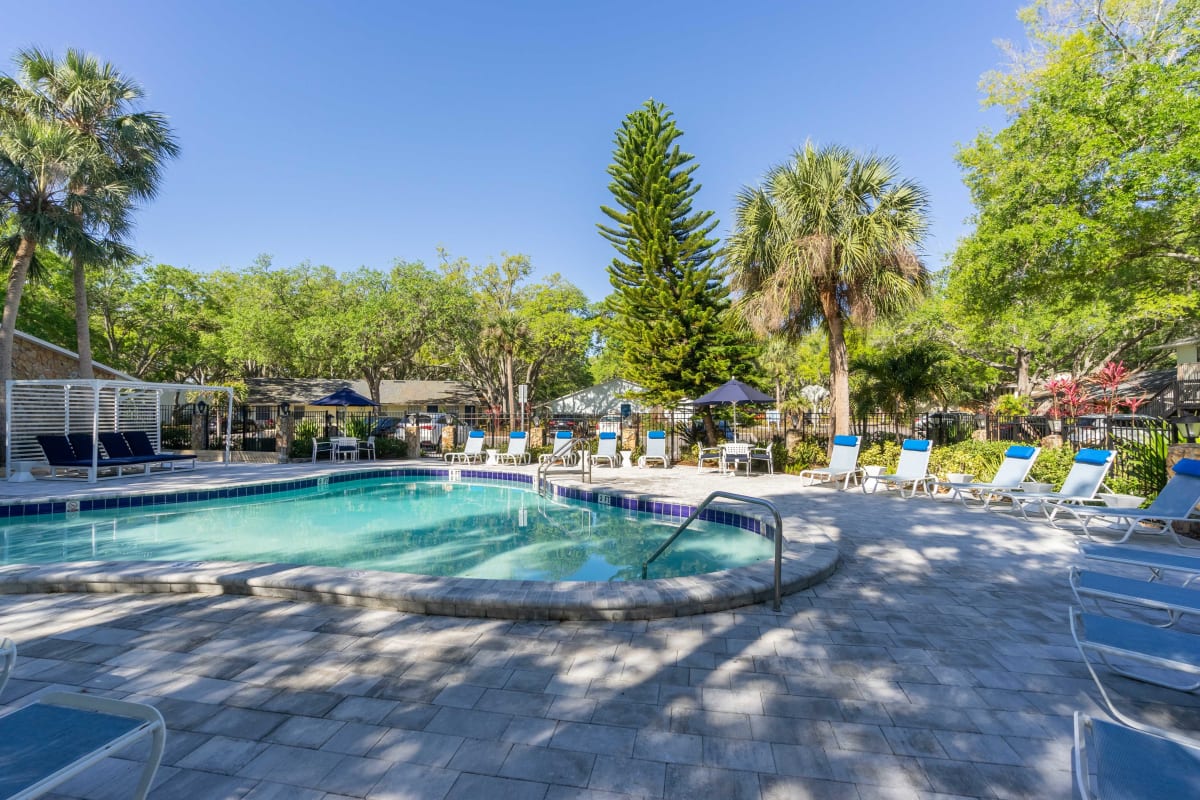 Lounge chairs by the pool at Sherwood Oaks in Riverview, Florida